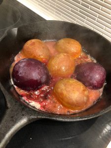 Plums Cooking in Cast Iron. 